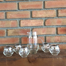 Load image into Gallery viewer, Vintage Barware Decanter Set by Libbey. 1950 Glass Martini Decanter with 5 Drink Glasses. Silver Rim. - Scotch Street Vintage