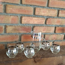 Load image into Gallery viewer, Vintage Barware Decanter Set by Libbey. 1950 Glass Martini Decanter with 5 Drink Glasses. Silver Rim. - Scotch Street Vintage