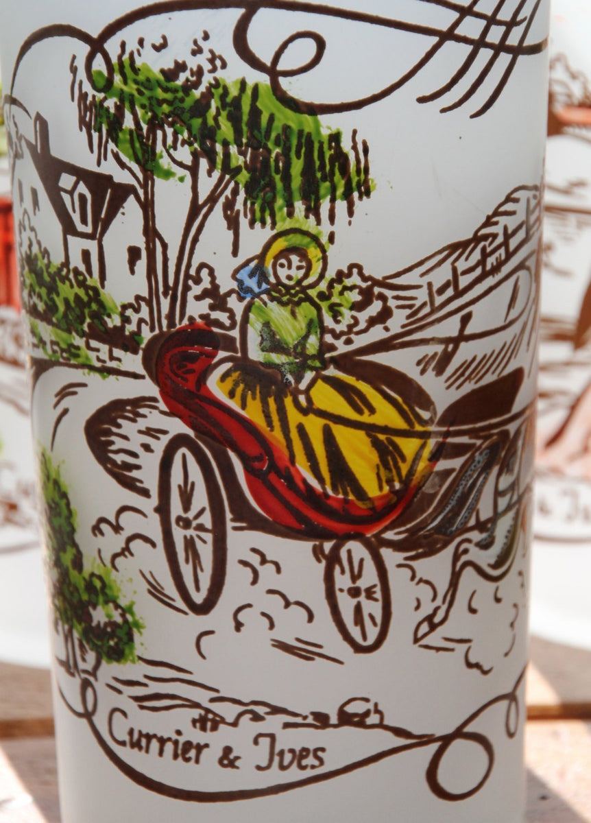 http://scotch-street-vintage.myshopify.com/cdn/shop/products/vintage-glassware-1950s-currier-and-ives-frosted-tall-tumbler-glasses-with-painted-scenes-and-caddy-896278_1200x1200.jpg?v=1604509053