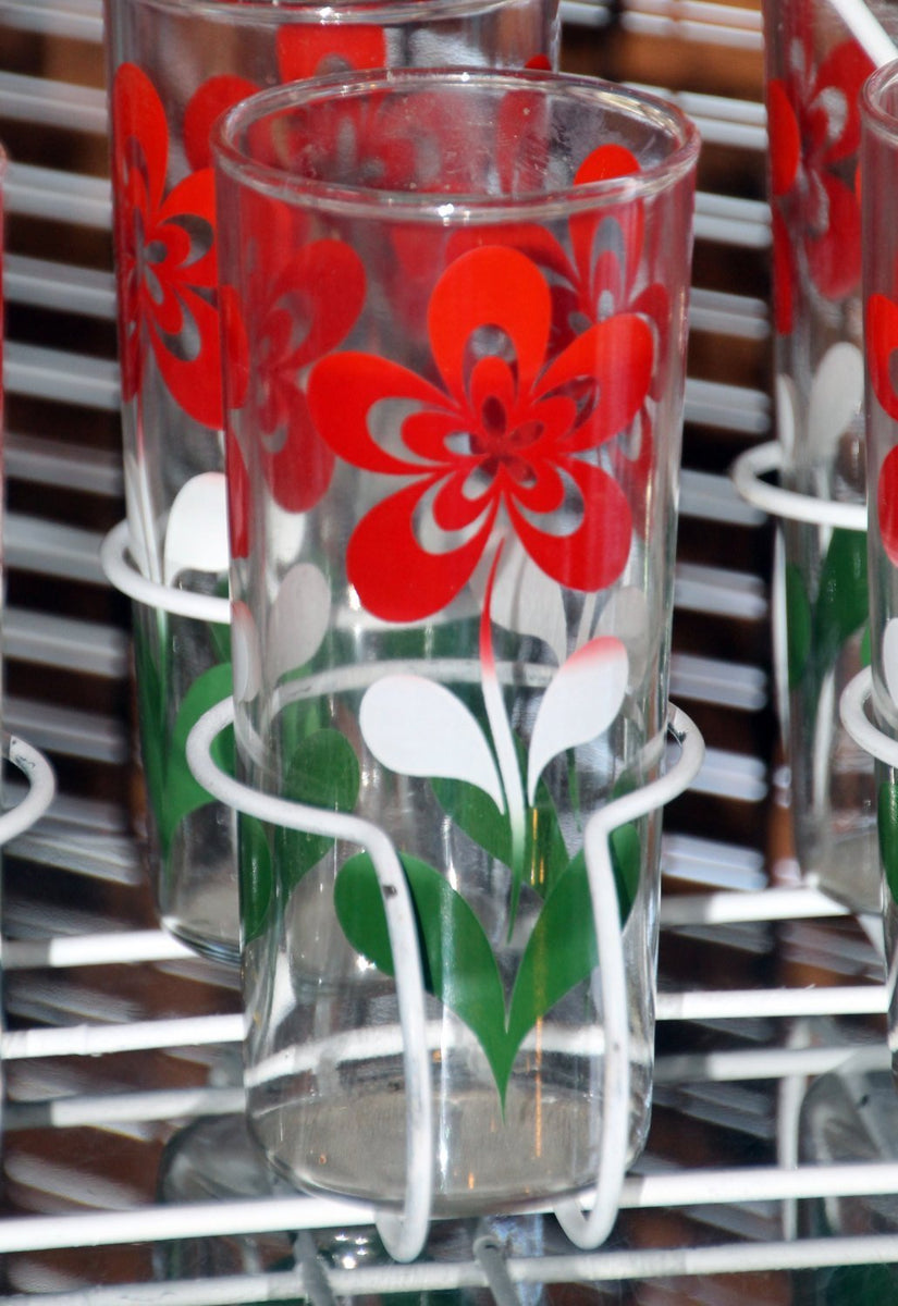 http://scotch-street-vintage.myshopify.com/cdn/shop/products/vintage-glassware-1960s-tall-tumbler-glasses-white-red-and-green-floral-design-and-white-caddy-235686_1200x1200.jpg?v=1604509091