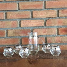 Load image into Gallery viewer, Vintage Barware Decanter Set by Libbey. 1950 Glass Martini Decanter with 5 Drink Glasses. Silver Rim. - Scotch Street Vintage