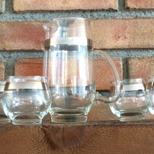 Load image into Gallery viewer, Vintage Barware Decanter Set by Libbey. 1950 Glass Martini Decanter with 5 Drink Glasses. Silver Rim. - Scotch Street Vintage
