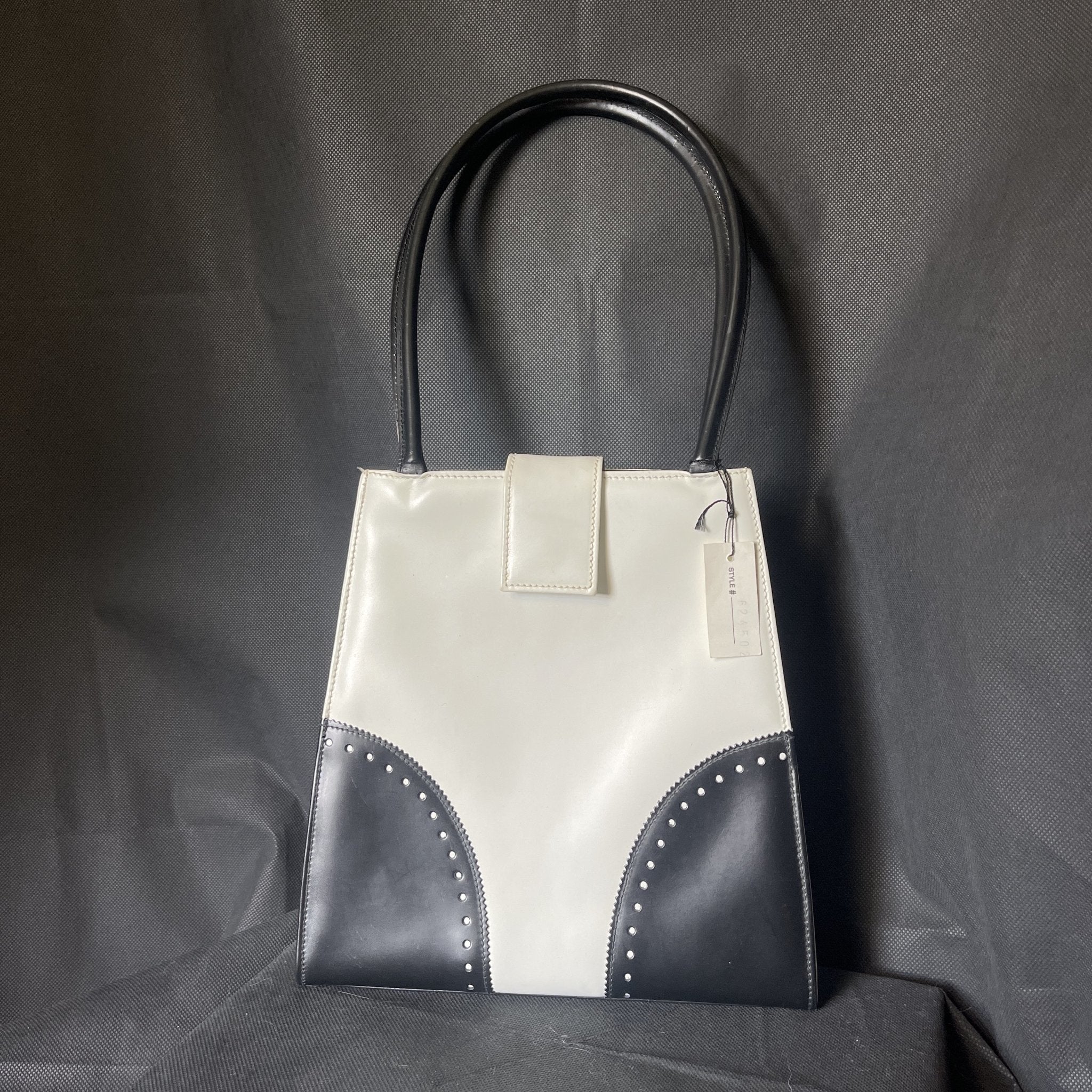 Saks Fifth Avenue Ebony Leather Handbag Made in Italy For Sale at