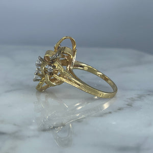 Vintage Diamond Cluster Ring with Old Hollywood Glamour. 14K Yellow Gold Setting with a Ribbon Design. - Scotch Street Vintage